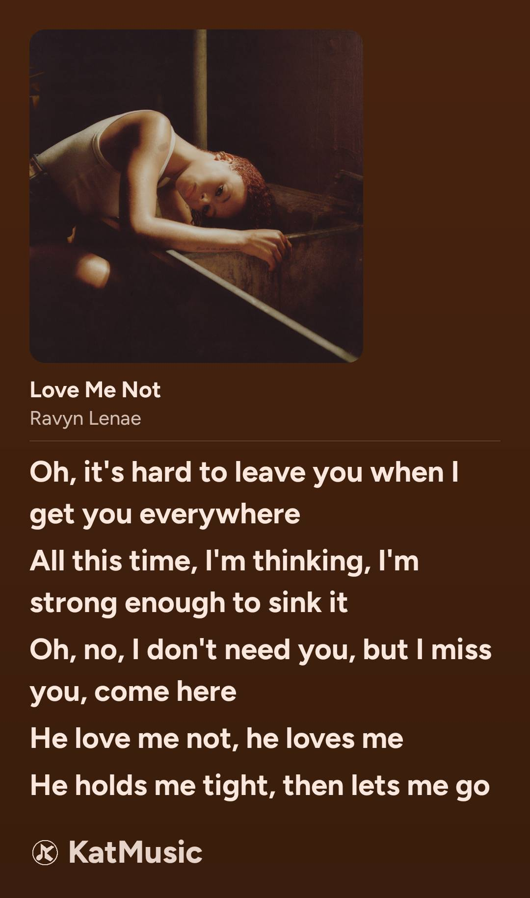 A KatMusic lyric card showing album artwork, the track title and artist, and lyric lines